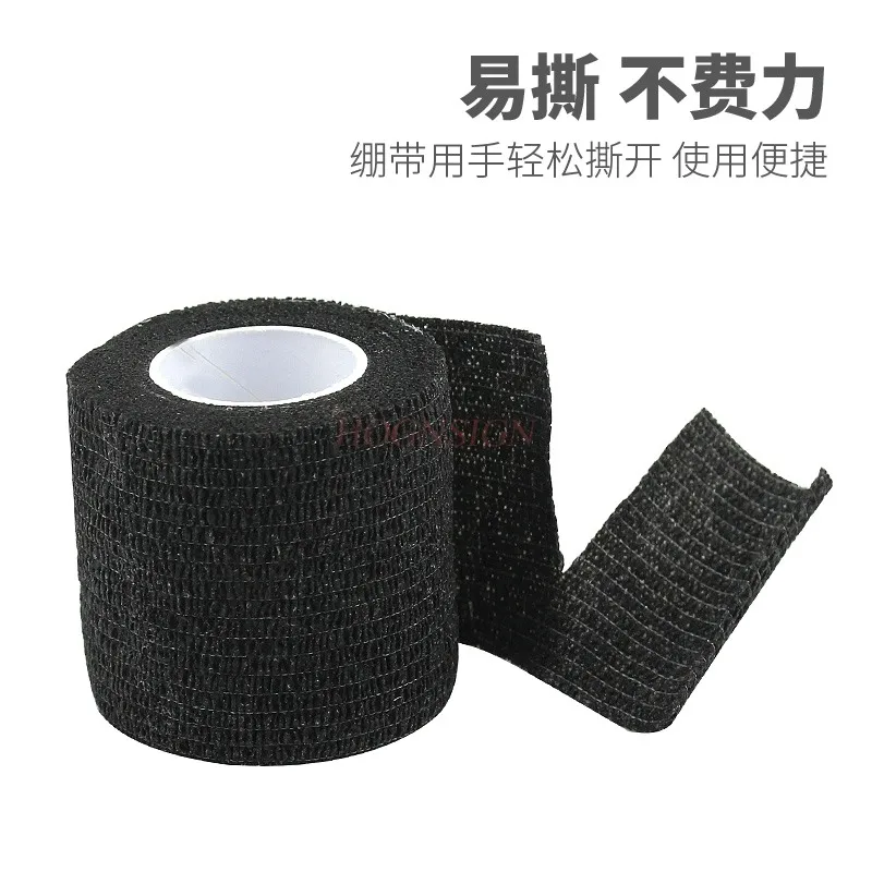 Disposable self-adhesive anti slip tattoo bandage with tattoo, machine handle, adhesive tape, grip sleeve