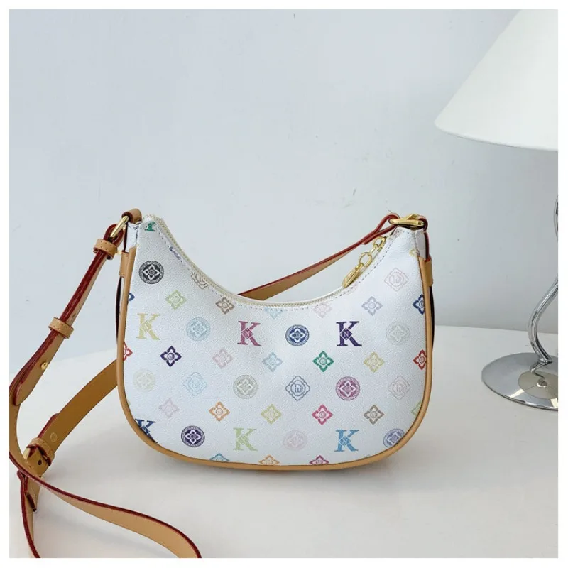 

Новинка 2025 года, уникальная женская стильная сумка в форме полумесяца с монограммой, подмышками/ручными/плечами, модный универсальный бестселлер, необходимый