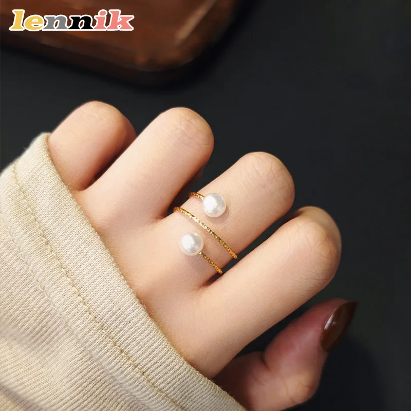 LENNIK Multi Layer Line Pearl Ring, Female Niche Design, Fashionable and High-end Sense, Movable Titanium Steel Gold Ring