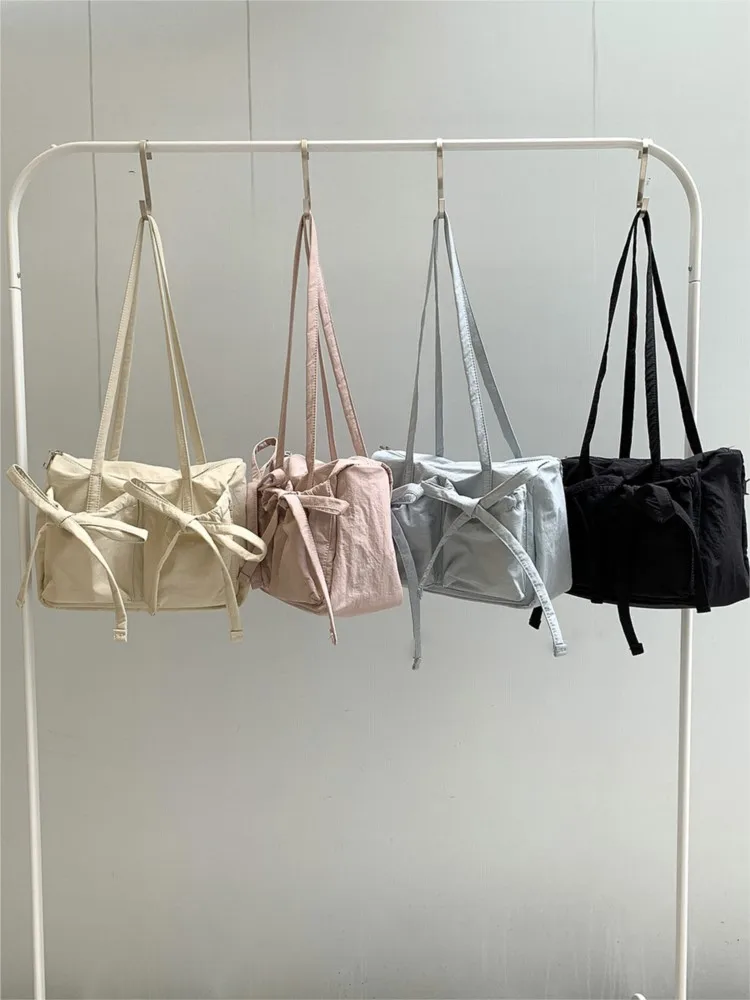 Bolsos de hombro de nailon con lazo para mujer, bolsos de viaje ligeros de gran capacidad, informales, a la moda, simples, coreanos, sólidos, 2024