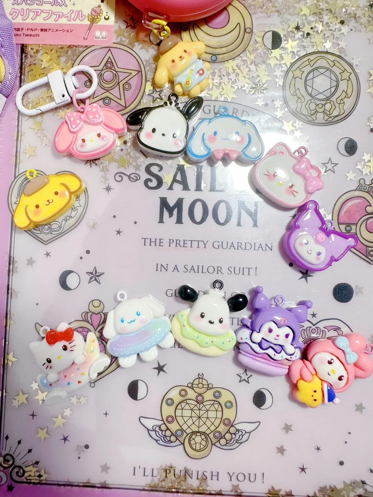 Sanrio Tamagotchi Uni ciondolo acrilico tappo antipolvere catena del telefono ciondolo a batteria Kuromi regalo di compleanno da collezione da tavolo Orname