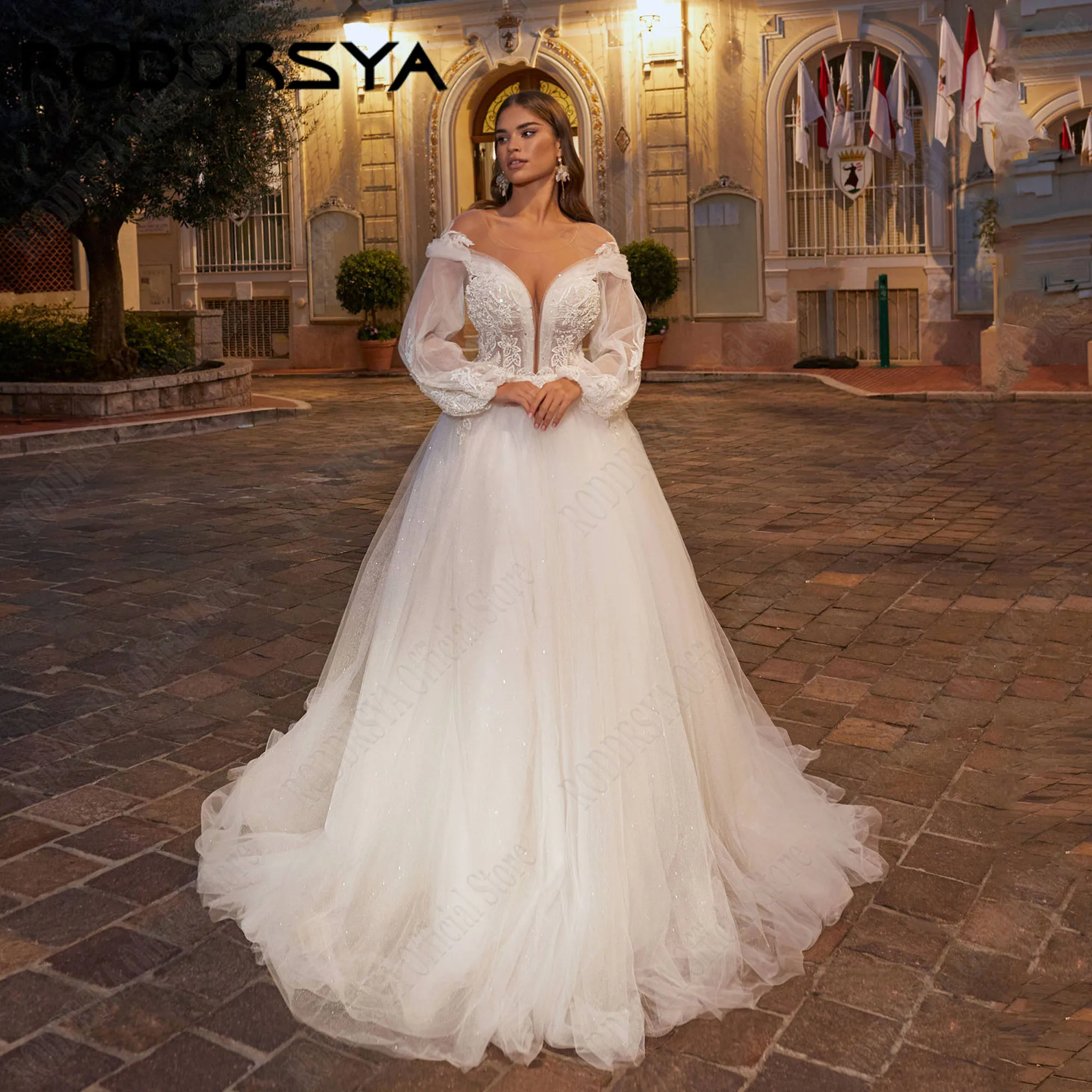 

RODDRSYA Customized Glitter Princess Wedding Dresses For Women Long Sleeve Illusion Back Shinny Tulle O Neck Bridal Gown 2025