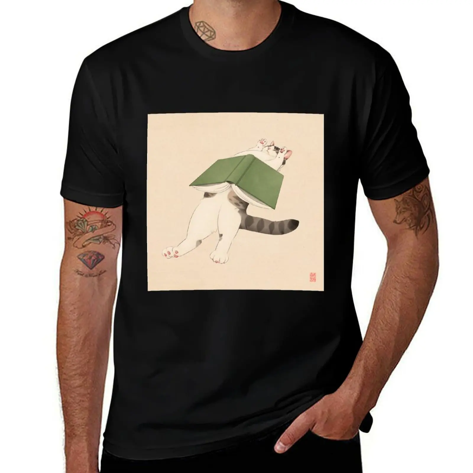 

Sleepy Cat with Book on Belly T-Shirt t shirts cotton 100% man tshirt cotton t shirts high quality T-shirt