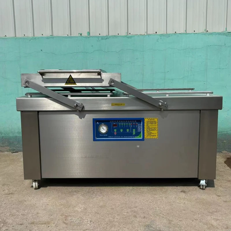 China Electric Semi-Automatic Vacuum Sealer for Seafood Sausage Fish & Meat Packaging with Film