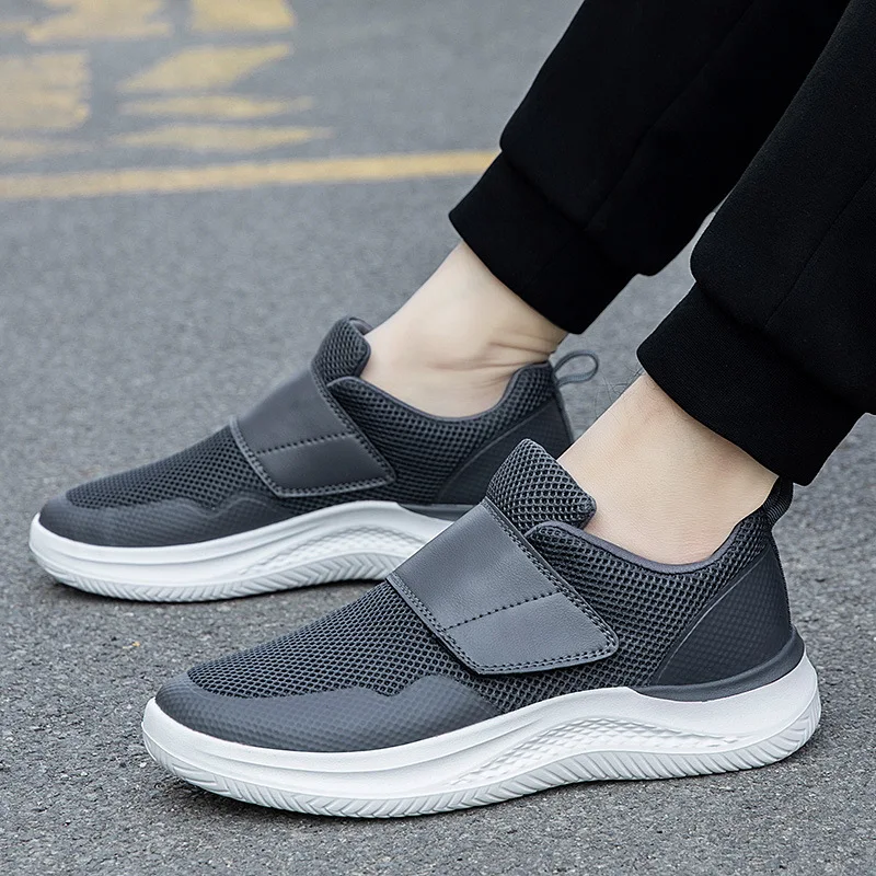 Lightweight soft-soled walking shoes non-slip and wear-resistant Velcro large opening middle-aged spring black new men's shoes