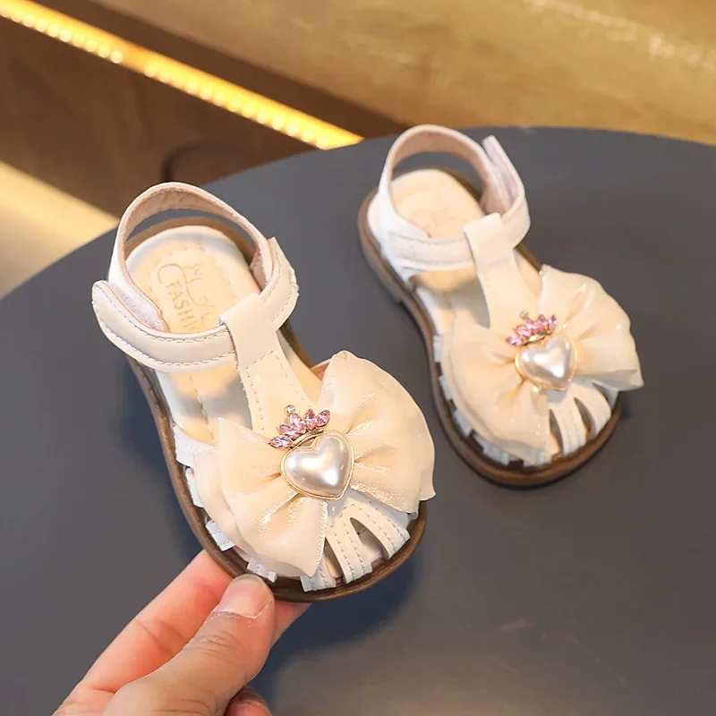 New Girls Sandals Cute Pearls PU Fashion Hollow Children Fashion Casual Princess Shoes Drop Shipping T-Strap Kids Wedding Shoes