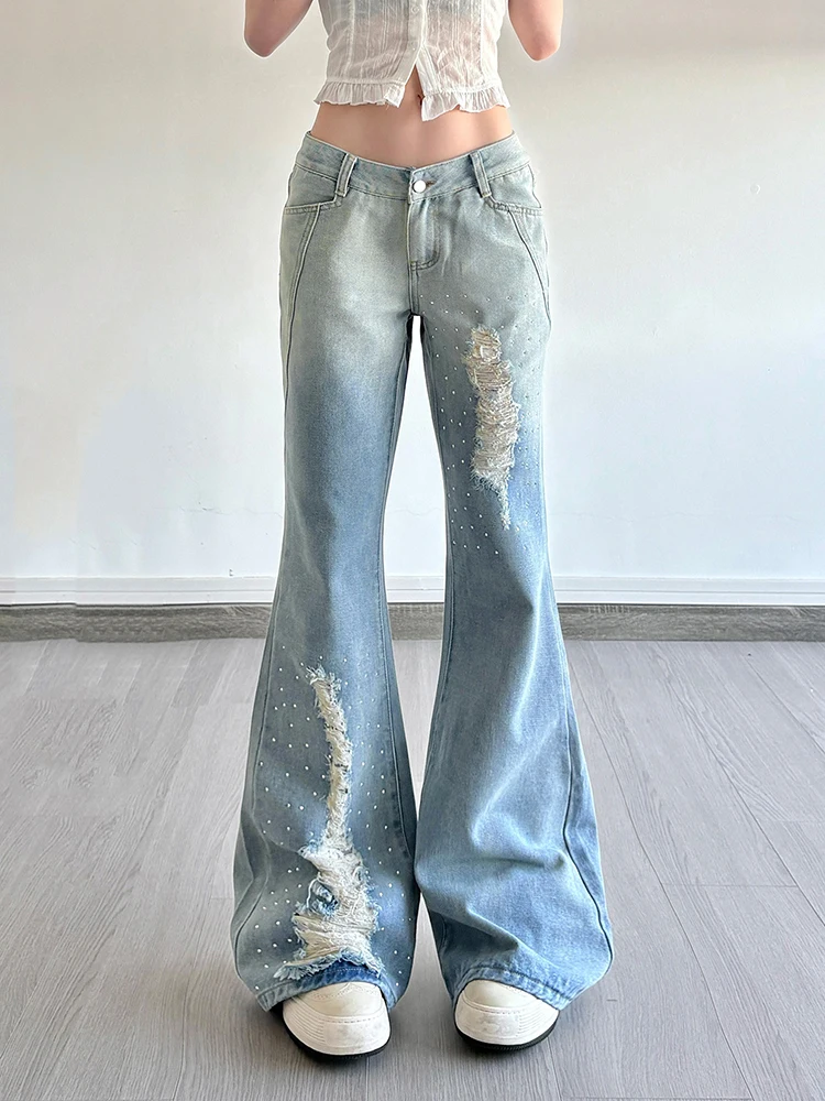Street niche design sense light blue ripped washed micro flared jeans summer women versatile slim fit fashion pants