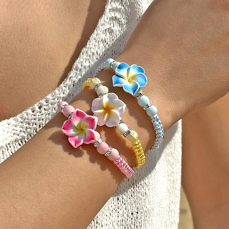 أساور هاواي للنساء البوهيمي المنسوجة أساور الزهور الاستوائية اليدوية جديلة الصيف الشاطئ مجوهرات للبنات اكسسوارات