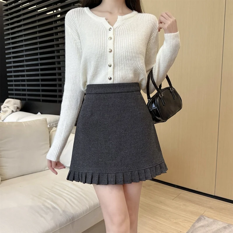 تنانير مزيج الصوف السميك الدافئ لخريف وشتاء 2025 للنساء تنورة كورية لطيفة عالية الخصر بقصة ضيقة ومزاجية فستان أنيق