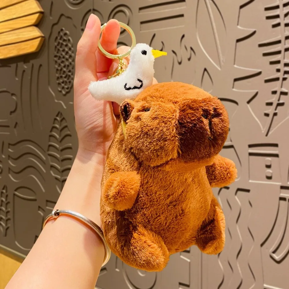 

Cute Doll Capybara Plush Keychain Stuffed Guinea Pig Simulation Capibara Animal Capy with Headband Anime Fluffty Toy