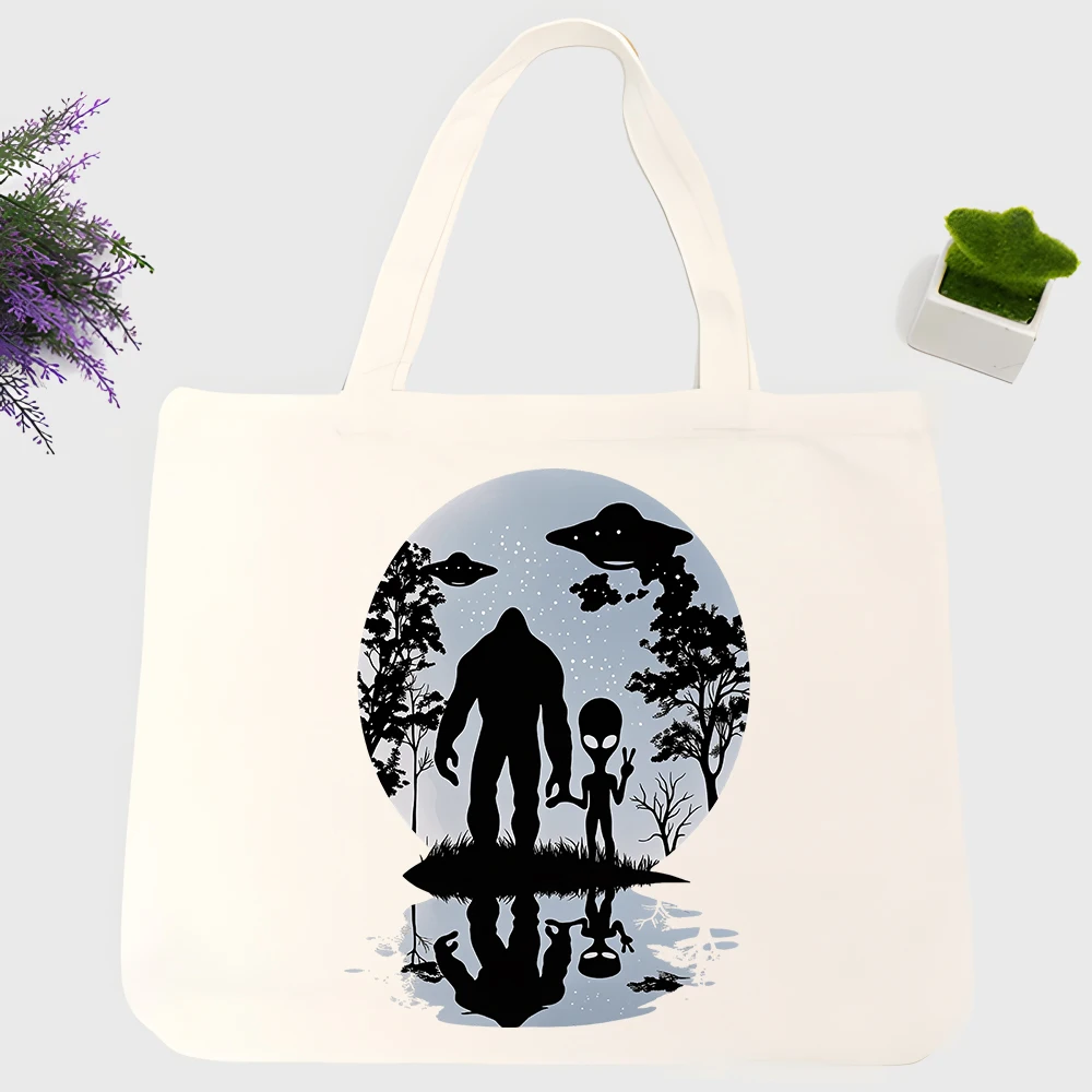 Men's fantasy creature and UFO graphic canvas tote bag, casual style for daily shopping and outdoor outings