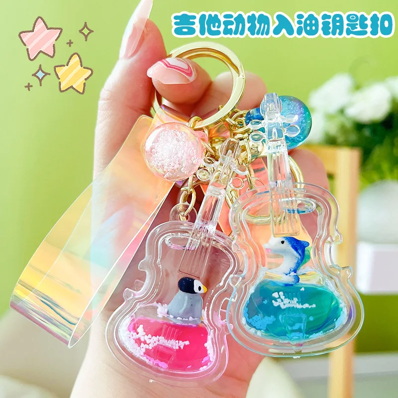 

Acrylic Oil-in Violin Car Key Chain Ocean Doll Quicksand Guitar Pendant Gift Jewelry Accessories Wholesale Girl Women