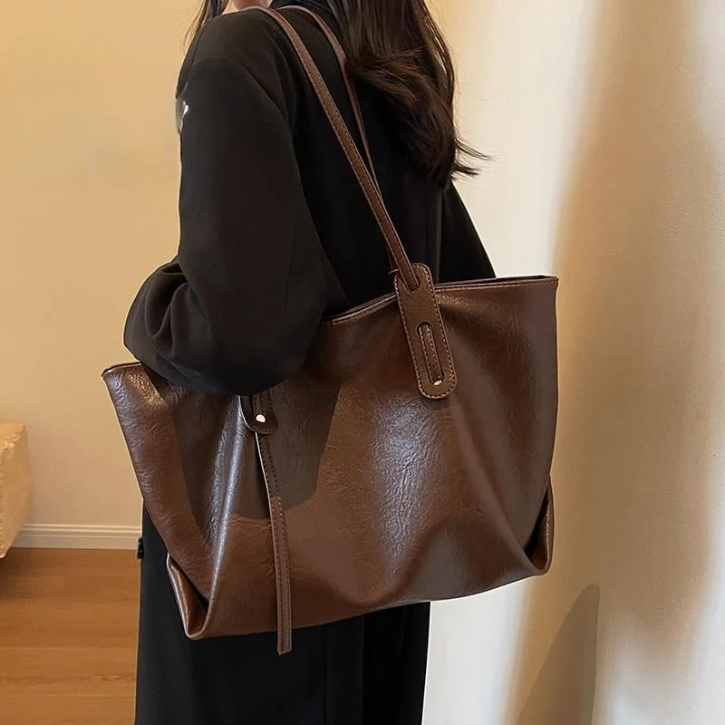 

Small Niche Design High-end Feel Oversized Capacity Commuting Bag New Simple Fashionable Portable Bucket Bag