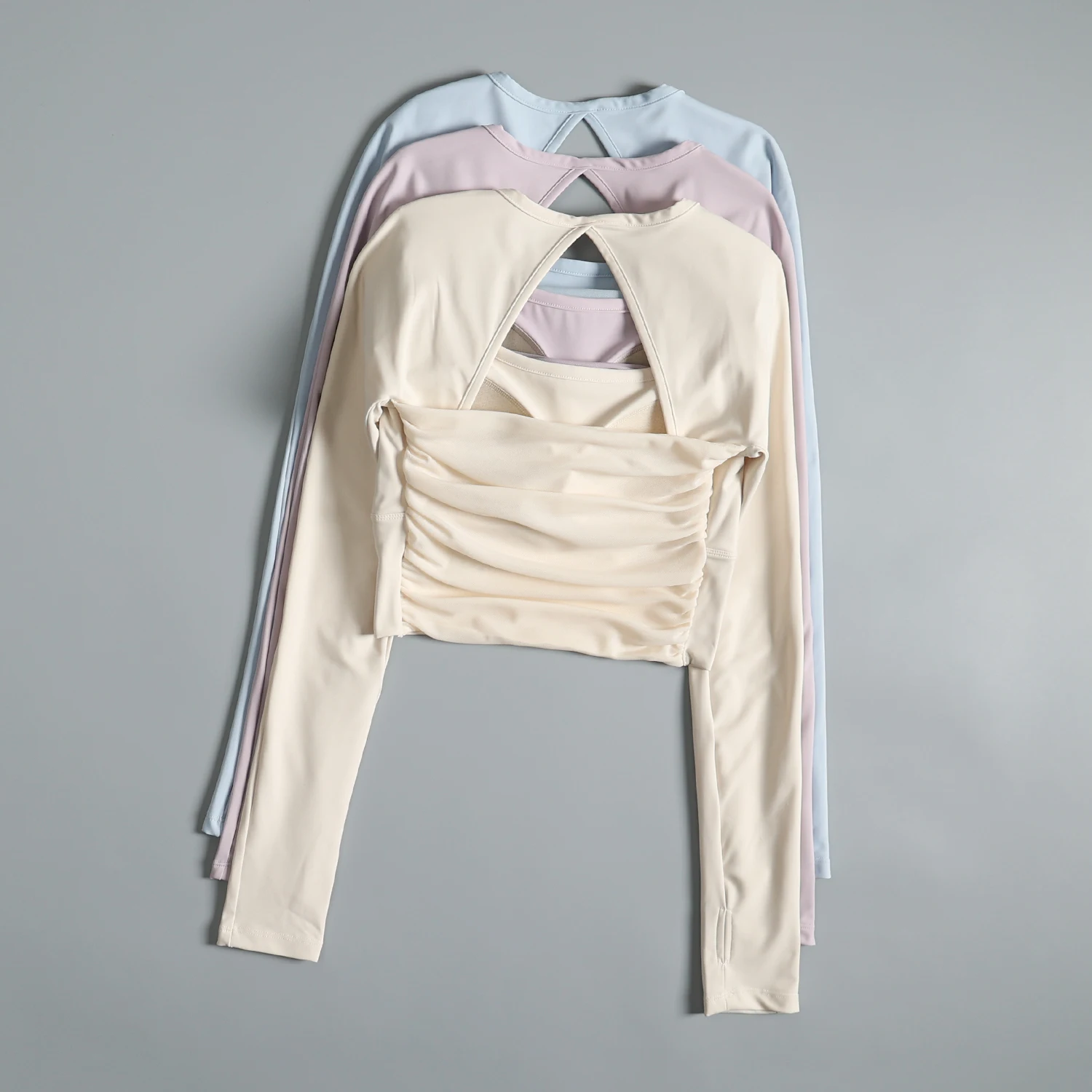 Yoga clothes with chest pads long-sleeved women's autumn and winter hollow beautiful back running training quick-drying
