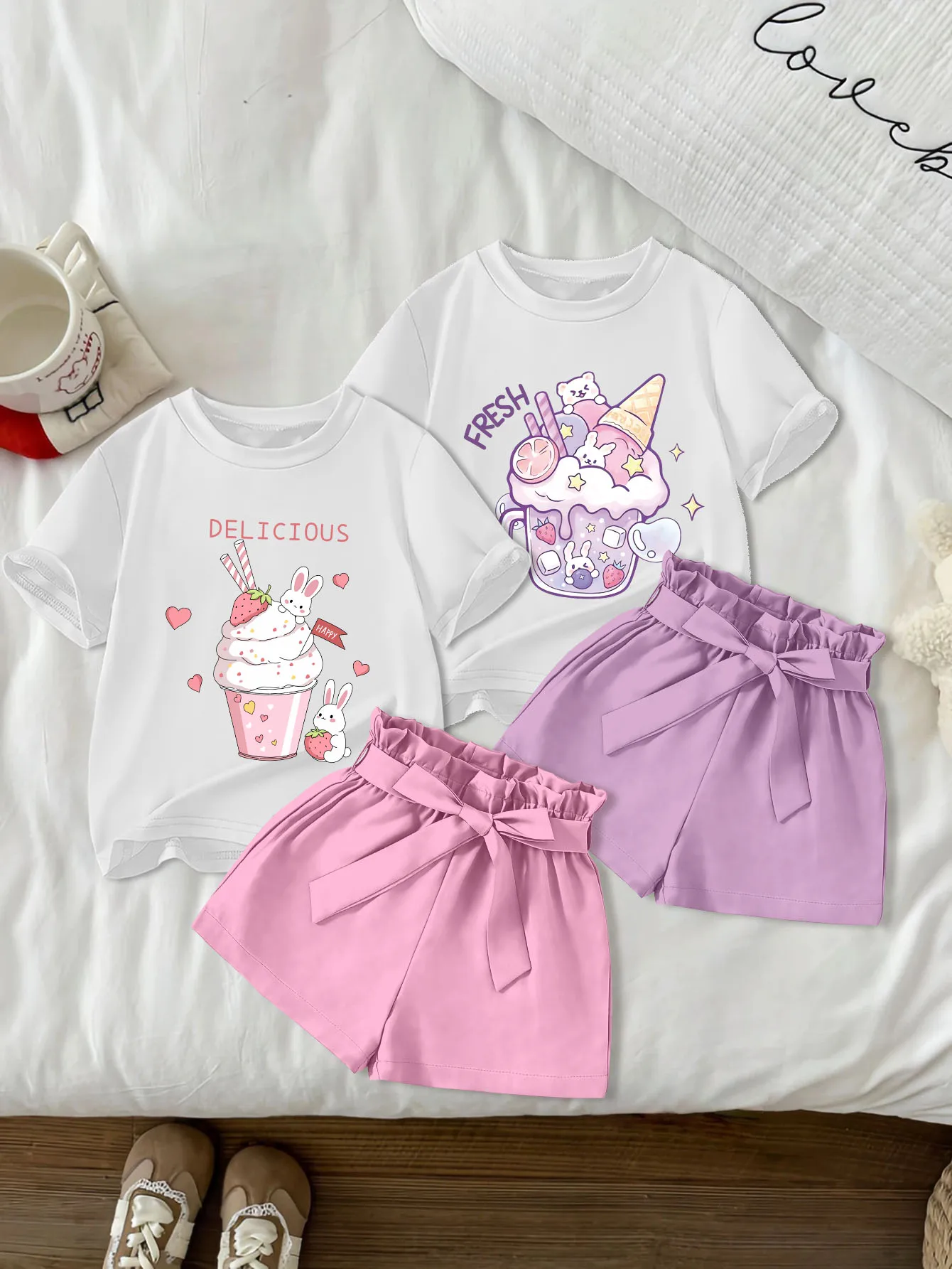 4 pieces: Easter-themed Summer Girls' Cute & Casual Round-Neck Short-Sleeve Woven Bow Shorts Set with Cartoon Rabbit Prints