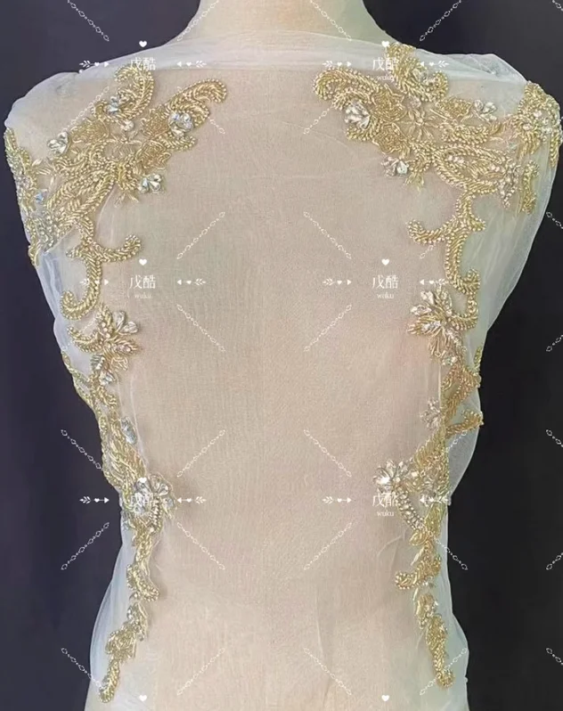 

Imported high-end Indian silk applique wedding dress cheongsam hi-fu mother's coat decorative beads.