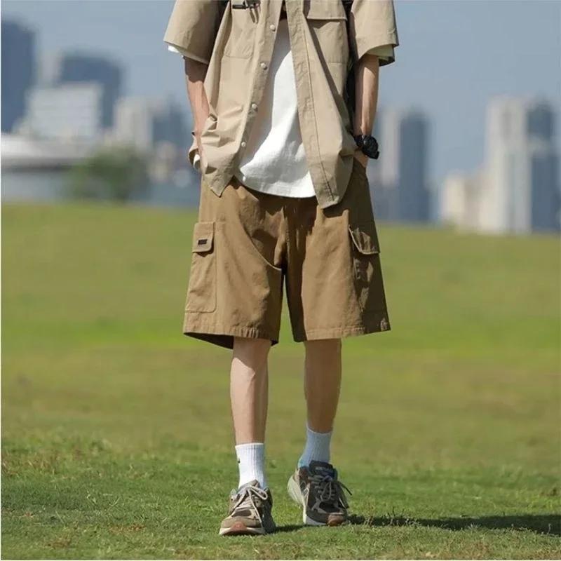 

Мешковатые однотонные мужские шорты-карго, свободные с карманами, полудлинные бермуды с эластичной резинкой на талии, широкие мужские короткие брюки, уличная одежда
