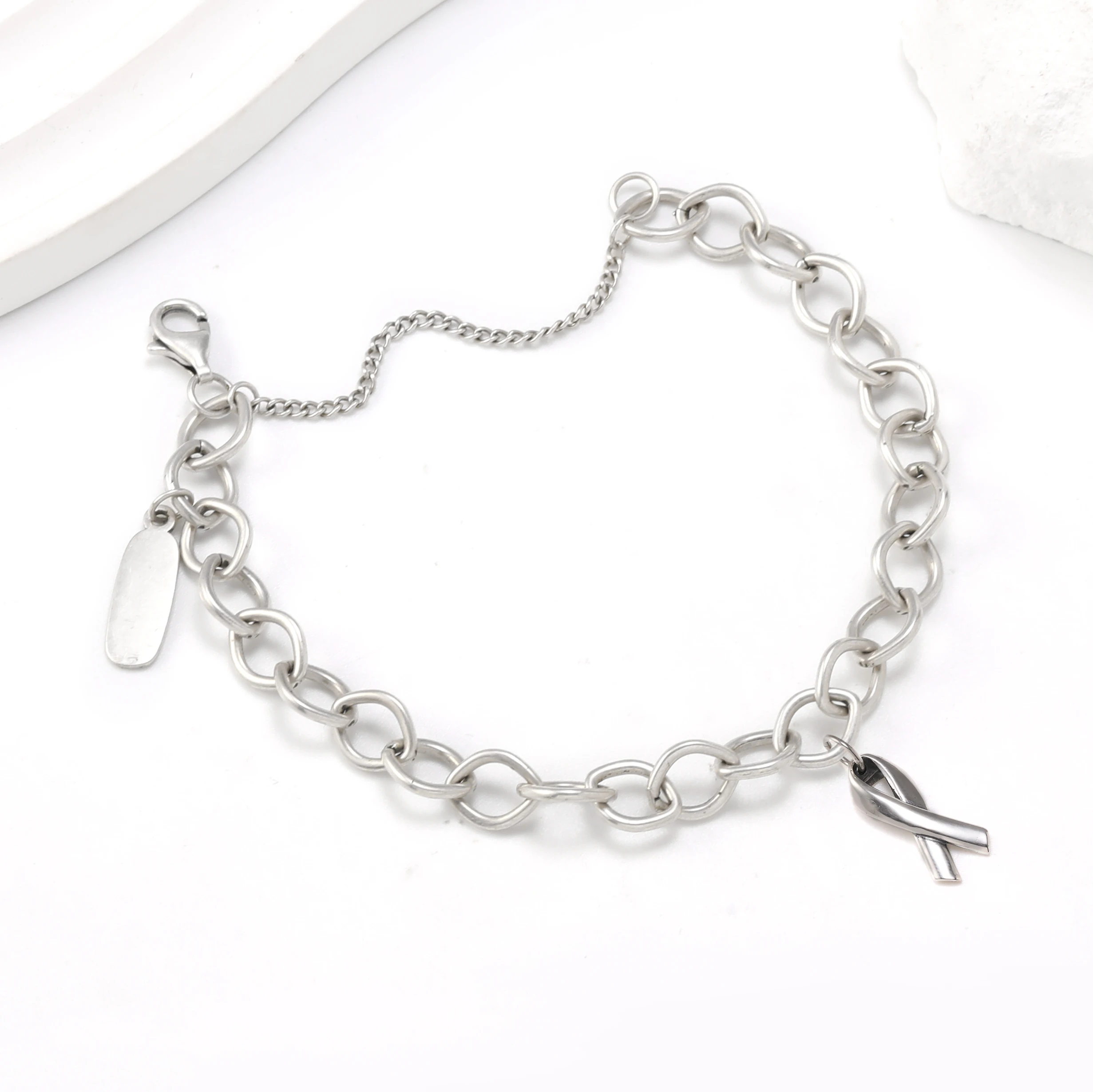 

Genuine 925 sterling silver James Avery Forged Link Charm Bracelet paired with Follow the Ribbon pendant