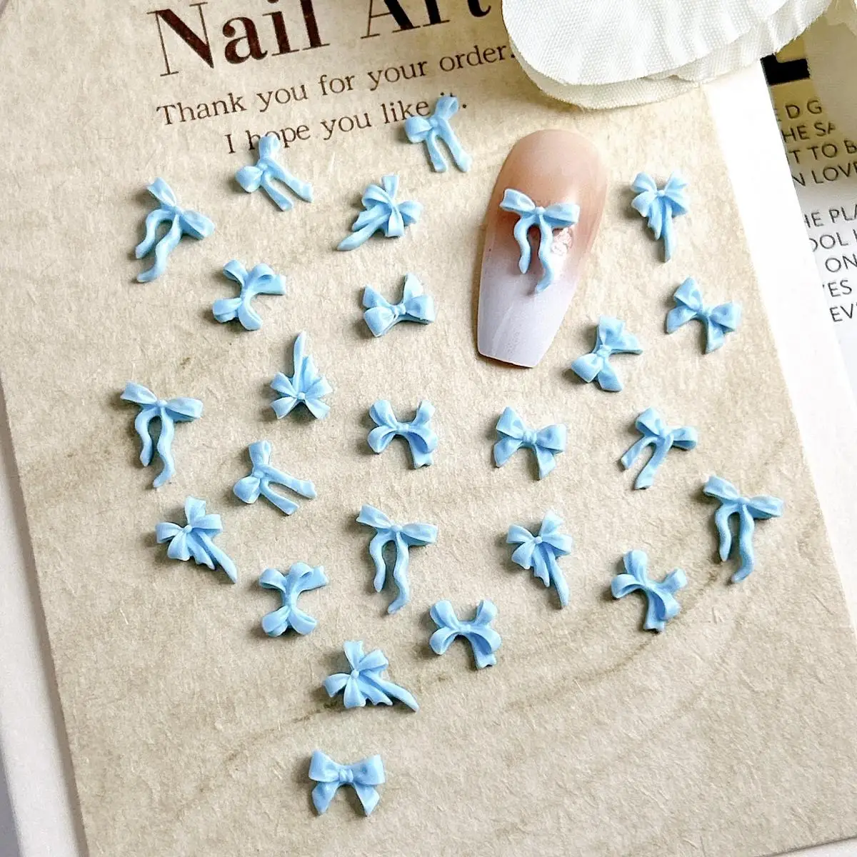 60 SZTUK Żywica 3D 5 stylów Mini kokardki do paznokci Przezroczysta niebieska kokardka Ozdoba do paznokci Etui na telefon Spinka do włosów Akcesoria do majsterkowania