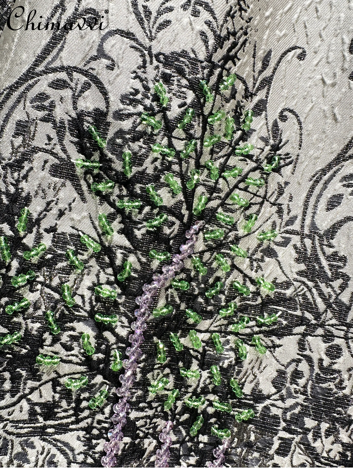 Cappotto di media lunghezza elegante con perline pesanti jacquard vintage di fascia alta 2026 Trench elegante con collo rotondo di nuova moda per le donne