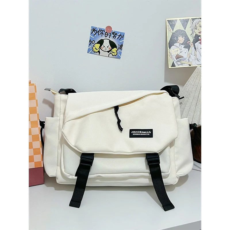 

Outdoor Travel Crossbody BagWomen's New Lightweight and Large Capacity Nylon Canvas Backpack, Armpit Bag, Tote Bag Un Sac Épaule