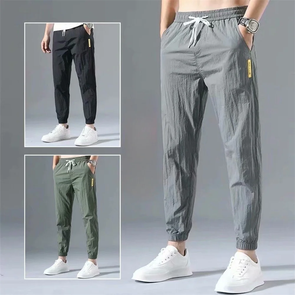 2024 New Korean Ice Silk Elastic Trousers Four Seasons Thin Casual Men'S Loose Straight Large Size Sports Jogging Pants Spring