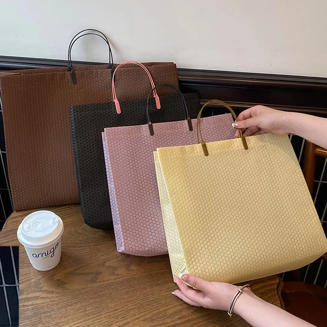 25 قطعة مجوهرات غير منسوجة حمل مقبض حقيبة الزفاف عيد ميلاد التسوق حفلة فستان يومي تي شيرت القماش مستحضرات التجميل تغليف الهدايا