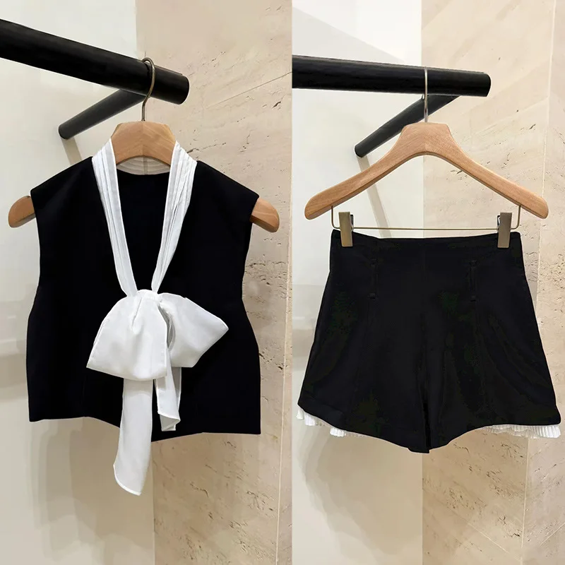

Women's black bow two-piece suit V-neck sleeveless top or casual shorts