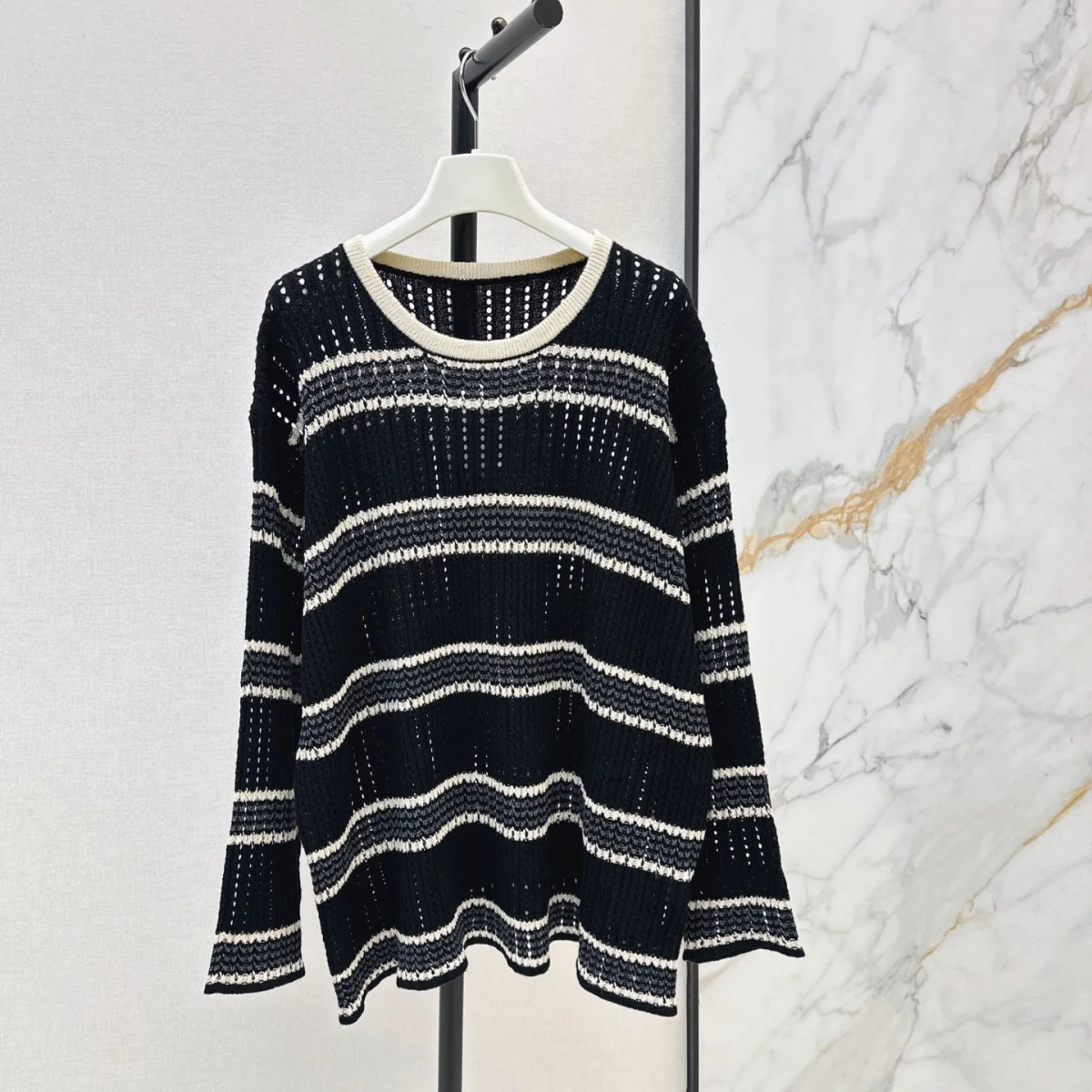 2026 High quality women's round neck contrasting striped hollow long sleeved knitted sweater--26811151