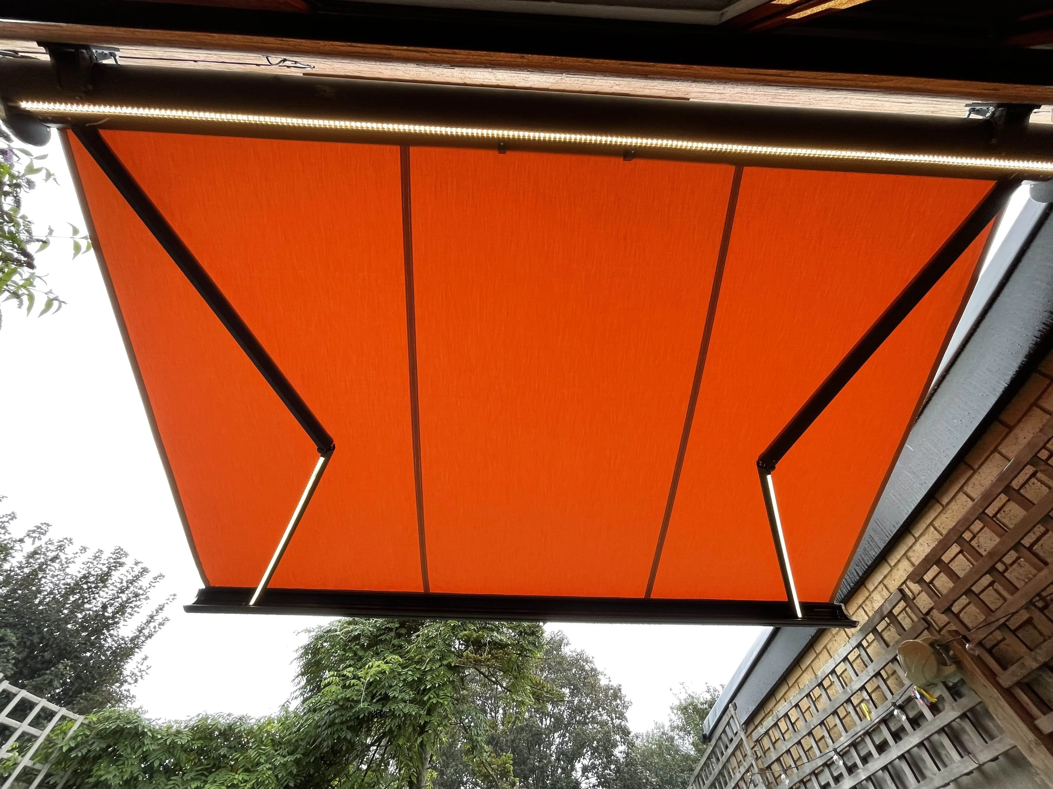 Modern Outdoor Retractable Awning with LED Lights HDPE Material Villa Rain Canopy Customizable Sizes
