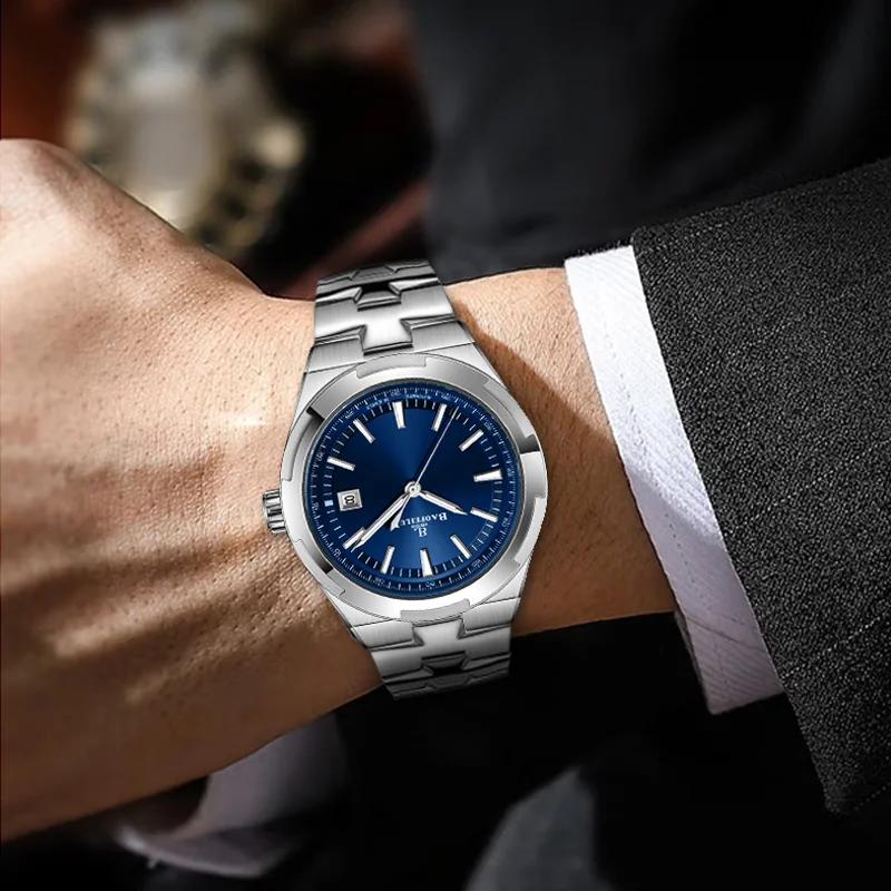 ساعة يد ميكانيكية أوتوماتيكية للزوجين من BAOFEILUN مصنوعة من الفولاذ المقاوم للصدأ وكريستال الياقوت وعرض التاريخ 50 متر مقاومة للماء هدية فاخرة