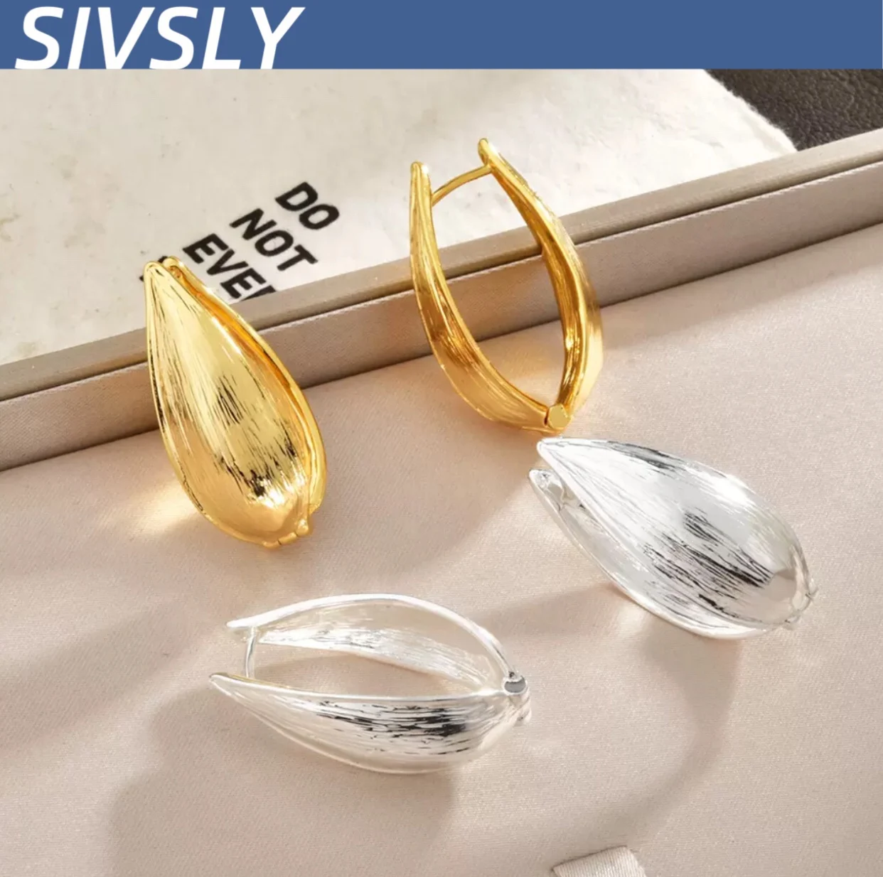 

[Unique] Double-sided texture willow leaf shape luxurious and versatile water drop ear clip elegant and high-end earring ear