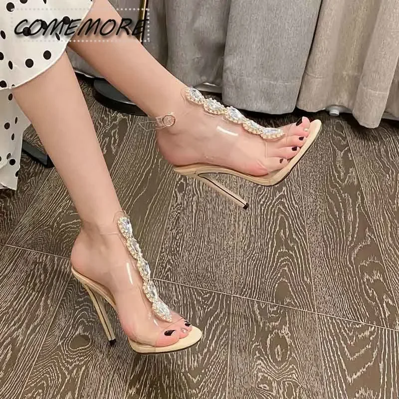 

Летние роскошные босоножки на высоком каблуке со стразами, прозрачные римские вечерние пикантные женские модные пикантные женские туфли с острым носком и пряжкой на щиколотке, новинка 2023 г.
