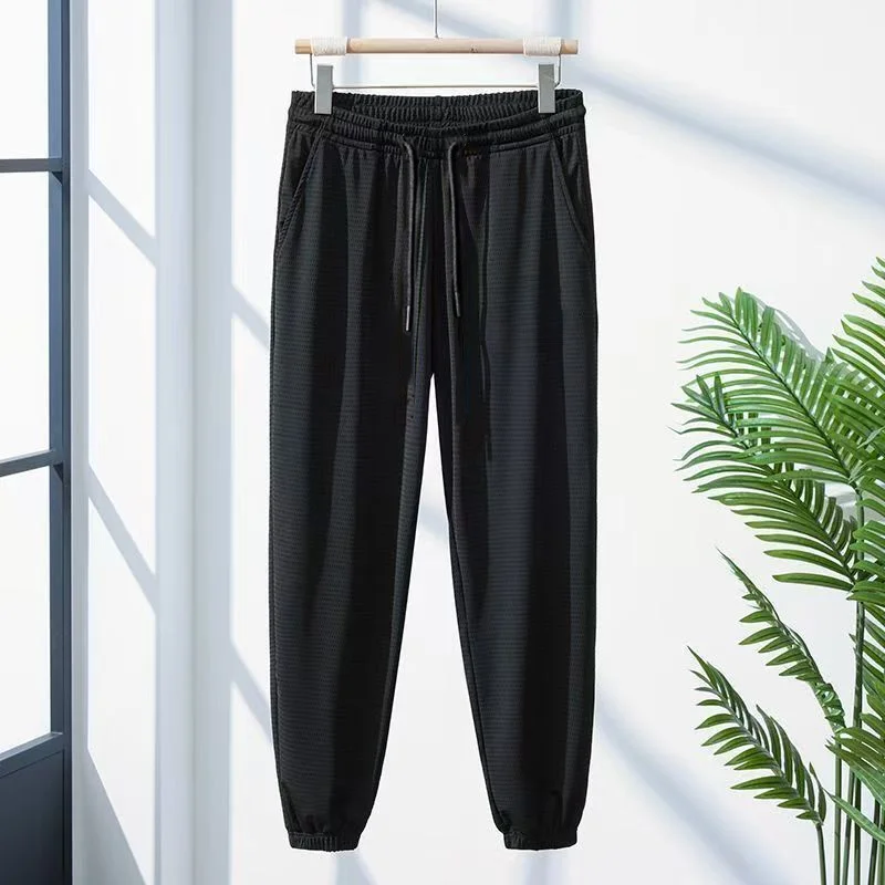 

Мужские повседневные брюки из ледяного шелка, дышащие, свободного кроя, больших размеров, спортивные брюки с охлаждающим эффектом, ультратонкие, быстросохнущие, летняя тонкая модель