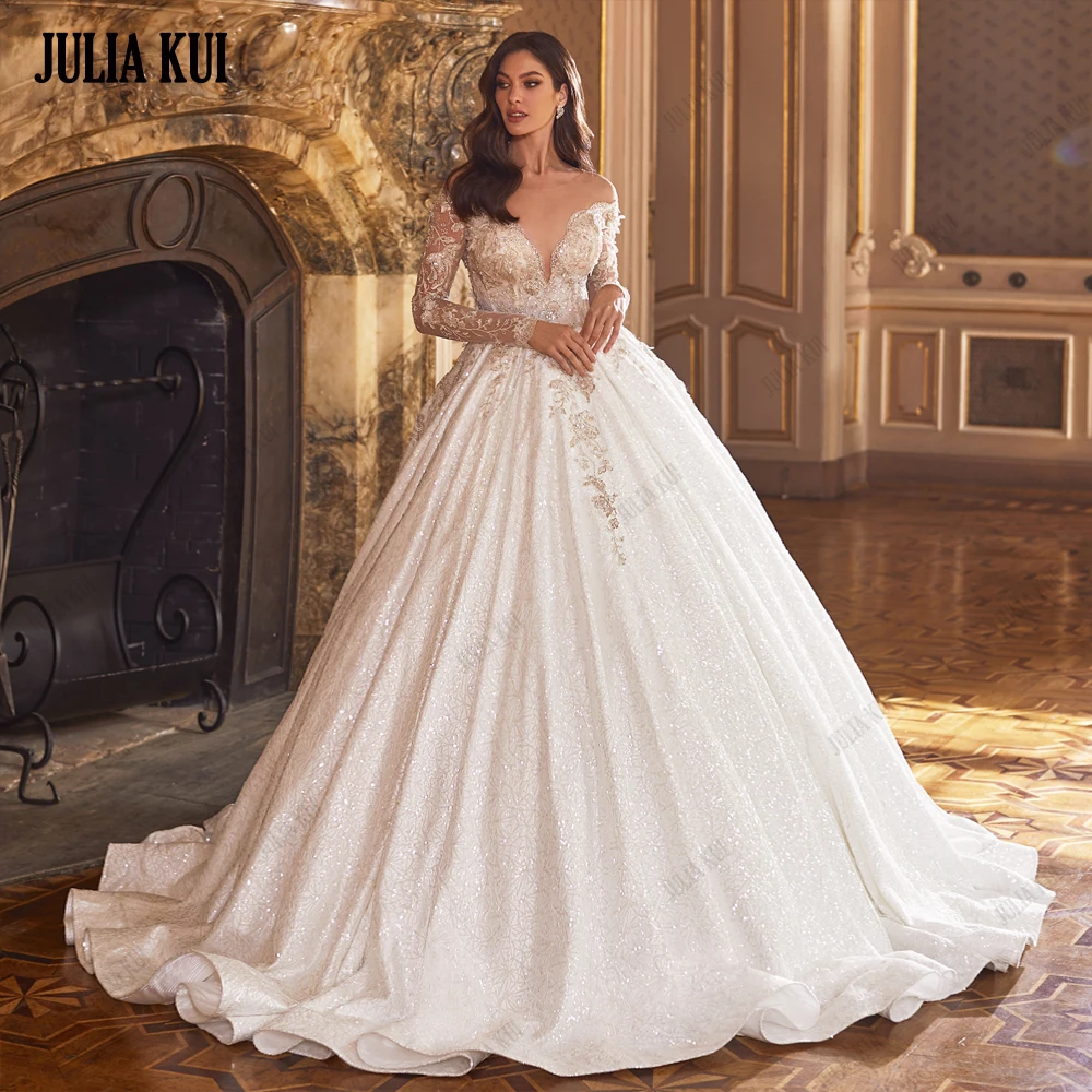 

Julia Kui Symmetrical Beading Lace Illusion V-Neck Full Sleeves Bridal Dress Court Train Wedding Gowns