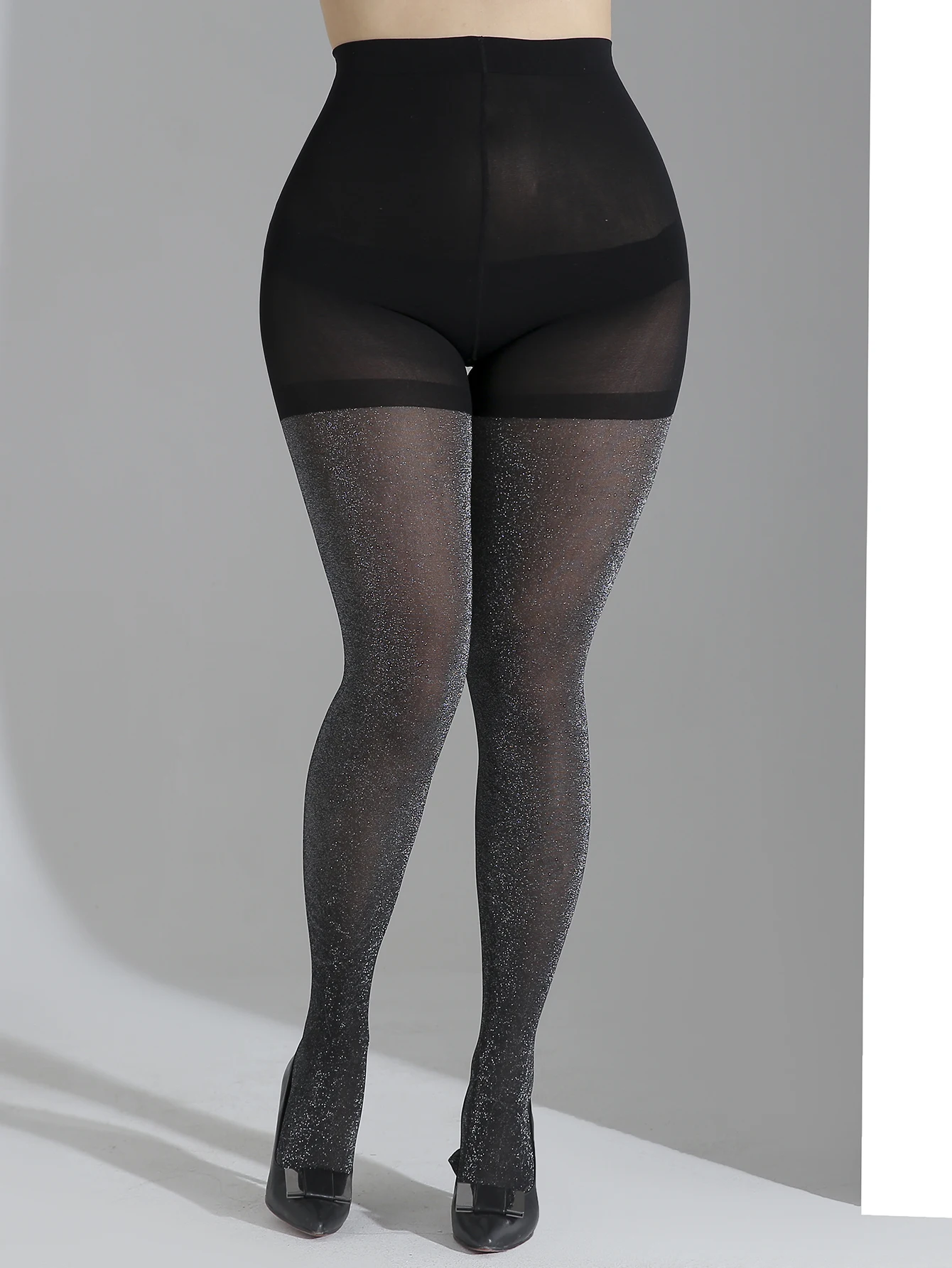 A pair of oversized bright silver pantyhose large size high quality stylish slim pantyhose