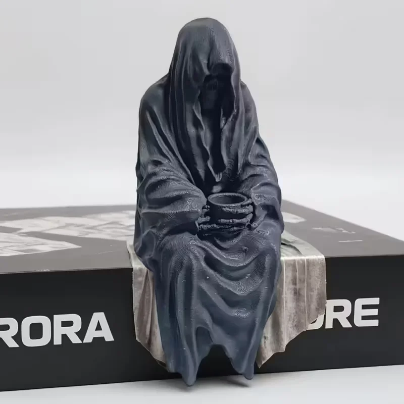 The sitting Death God is a perfect gift for holidays like Halloween and is suitable for indoor bookshelves, etc