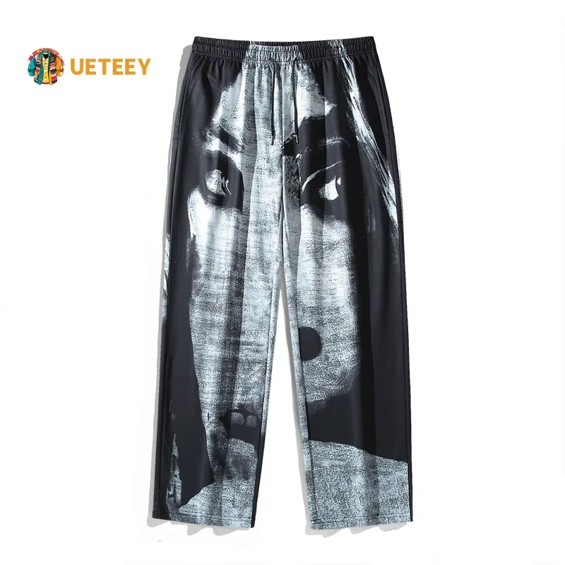 

American Style Stylish Hip Hop High Street Pants Men Abstract Facial Printed Design Casual City Walk Trousers Male Hot Sale