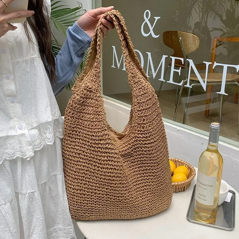 High-end hand-woven straw tote bag for women – large capacity beach vacation bag with versatile seaside style view 2