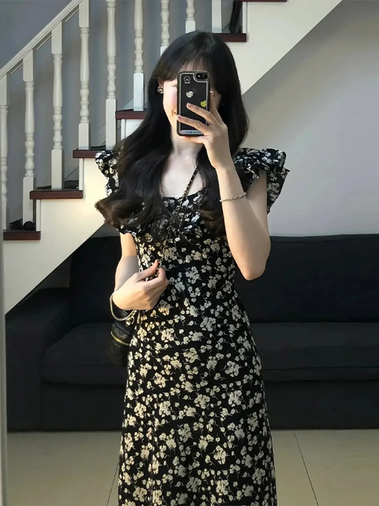 Sukienka maxi w kwiatowy wzór, damska, letnia, nowość 2025, wyszczuplająca, podkreślająca talię, idealna na plażę i wakacje, styl koreański.