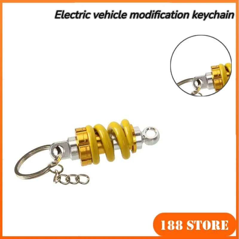 

Aluminum Alloy Shock Absorber Key Ring - Stylish Automotive Front Strut Pendant for Cars & Scooters