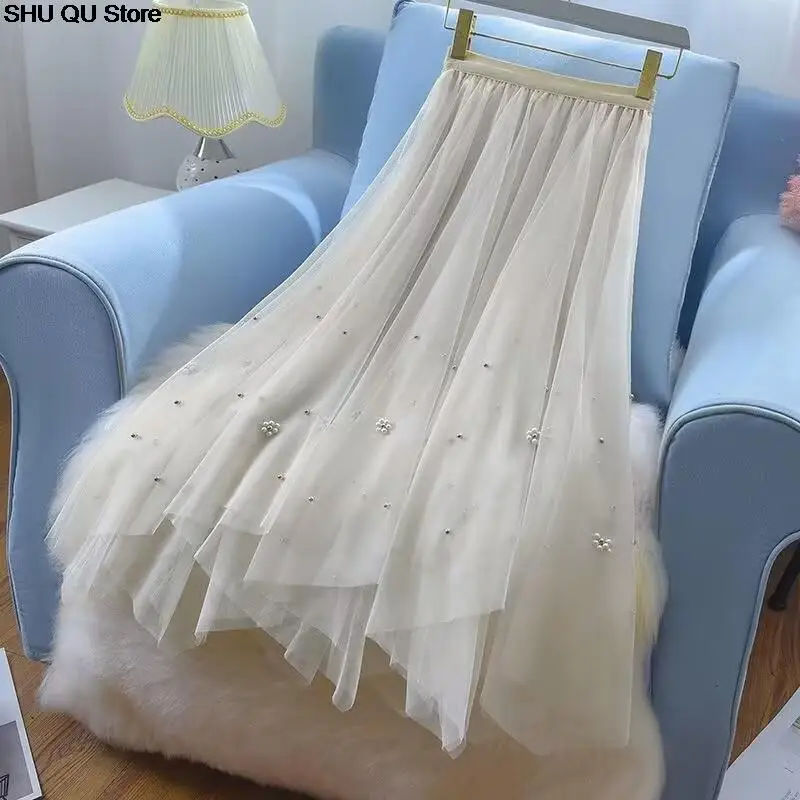 تنورة شاش مطرزة غير منتظمة جديدة لعام 2025 للنساء بخصر عالٍ تنورة عصرية تناسب الجميع على شكل حرف a متوسطة الطول بطول الإناث