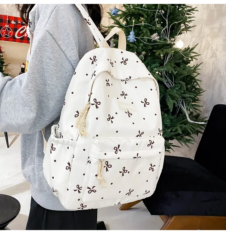 حقيبة ظهر كلاسيكية مطبوعة بعقدة على شكل فيونكة حقيبة كتب مدرسية ذات سعة كبيرة لطلاب المدارس الثانوية المتوسطة حقيبة سفر على طراز الكلية Harajuku #4