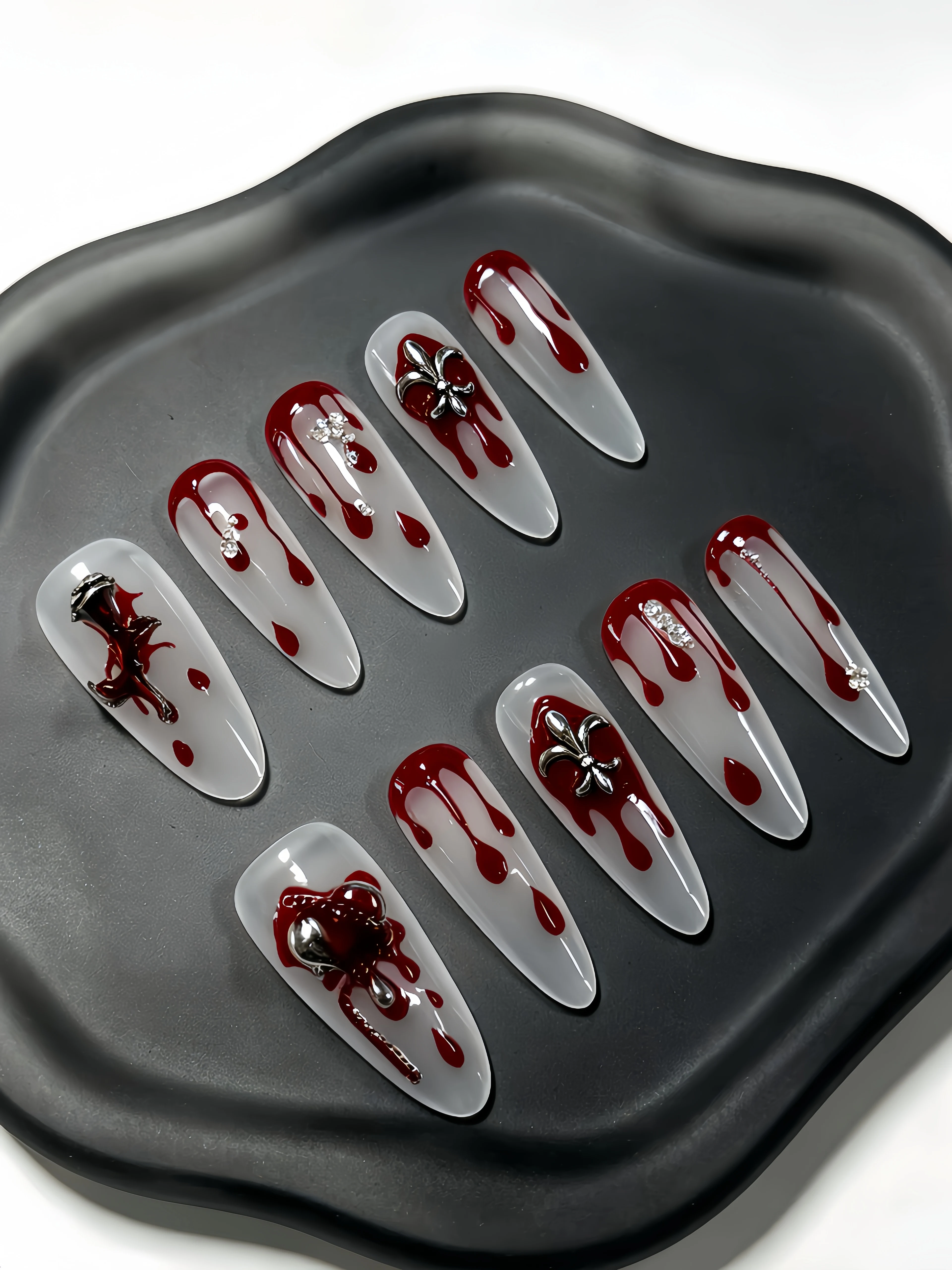 10 Long Waterdrop-Shaped Press-On Nails, with a Milky White Base Color Paired with Red Waterdrop Metal Chain Flower Decorations and Rhinestone Elements, Simple and Stylish Nail Art Patches for Y2K Gothic Style Enthusiasts, Suitable for Daily Use, Work, Office, Bars, Clubbing, Music Festivals, Etc., Punk Style Fake Nails, Suitable for Parties, Swimming, Summer Dates, and Punk Style Nail Art. Includes One Jelly Glue and One Nail File view 3