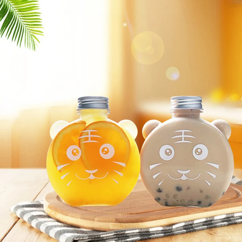 

1Pcs Plastic Juice Tiger-Shaped Beverage Bottles Cartoon Milk Juice Cold Drink Milk Tea Cartoon Yang Juice Orange Dew Bottle