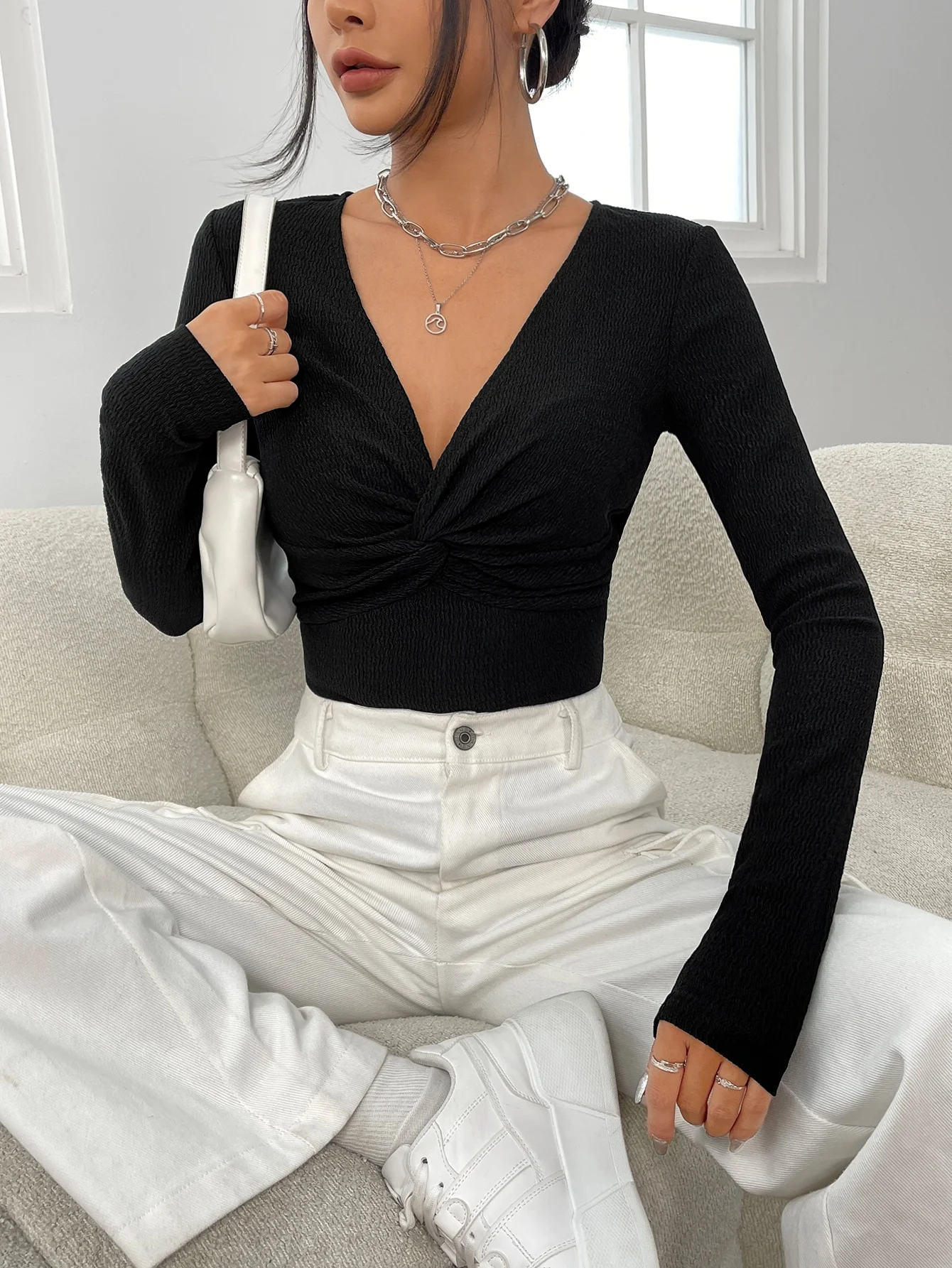 Spring new temperament simple commute kink slimming generous deep V-neck knitted long sleeve blouse woman