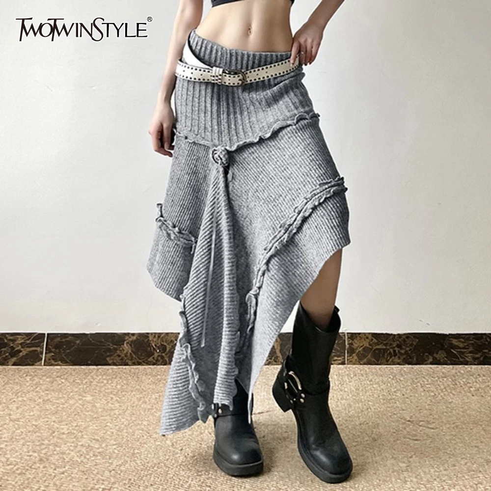 TWOTWINSTYLE Solid Spliced Belt Irregular Skirts for Women High Waist Temperament Minimalist Skirts Female Fashion