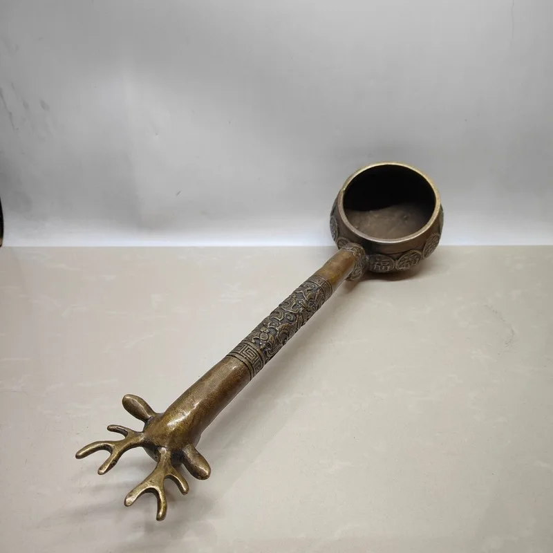 Antique and miscellaneous collectibles, including antique-style, aged brass spoons