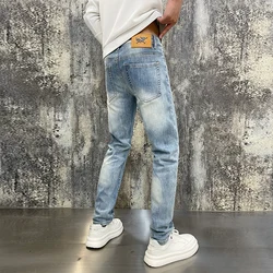 High-end Korean version of the light luxury men's jeans stretch Slim autumn and winter retro light blue men's models trousers me