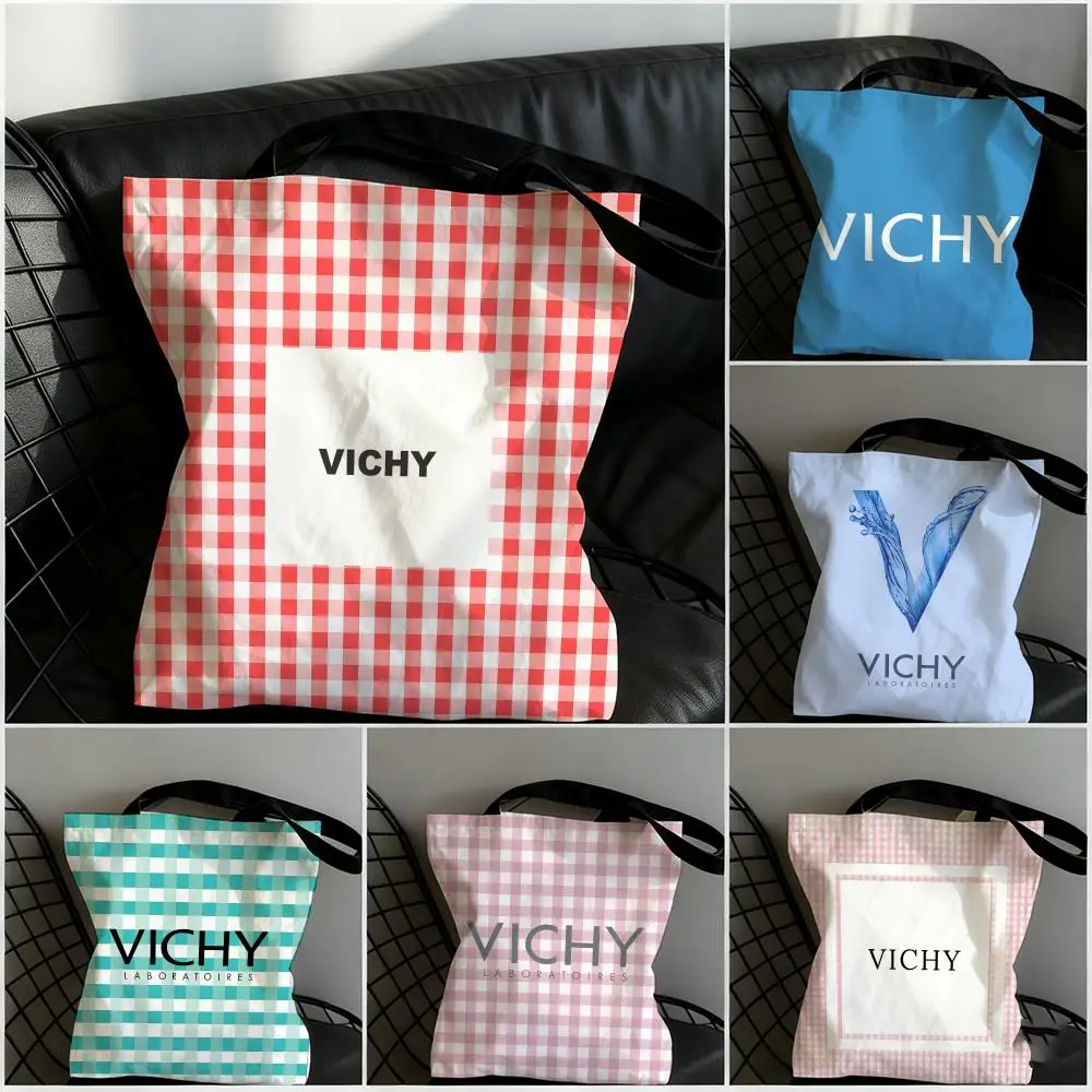 Bolsas de almacenamiento de la marca de maquillaje V-vichy, bolsa de lona de gran capacidad para estudiantes mujeres para guardar libros, bolso de mano para mamá